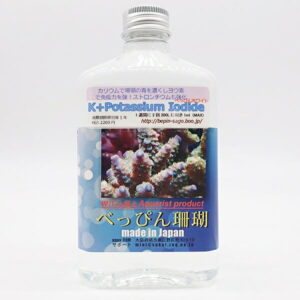Clear plastic bottle labeled 'K+ Potassium Iodide' for aquariums, with a coral photo on the front label.